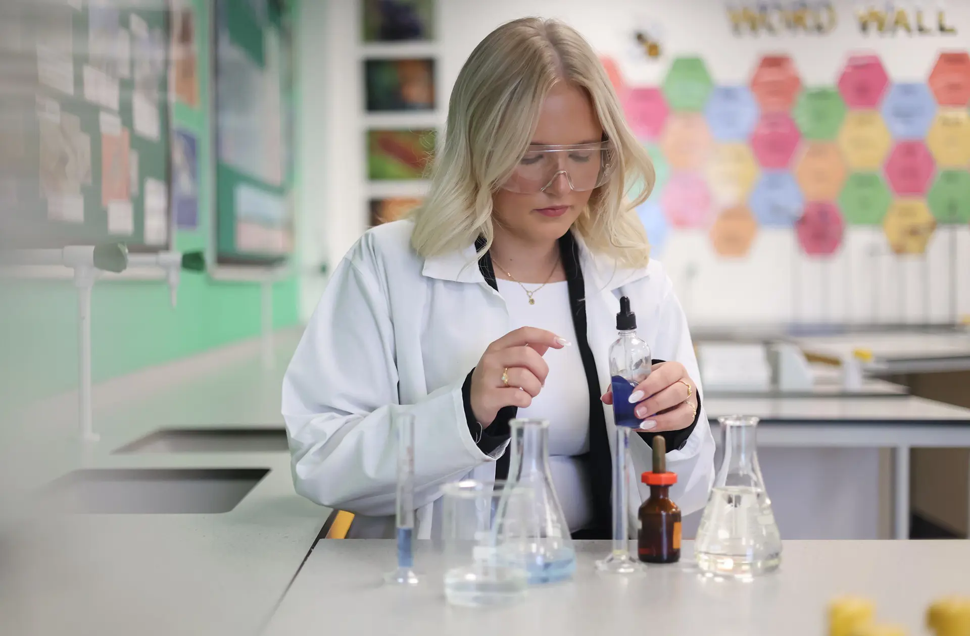 Student doing science work in class