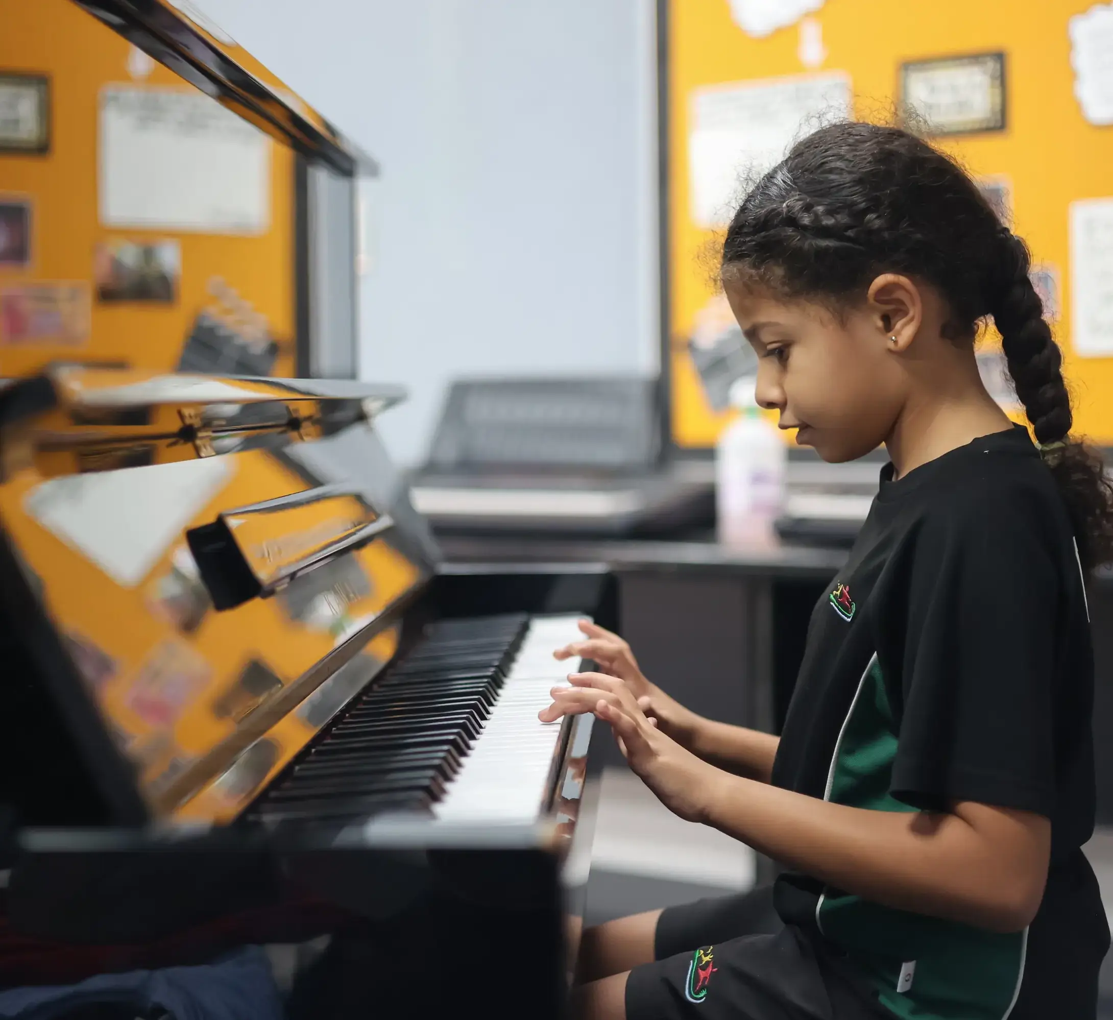 Student playing piano