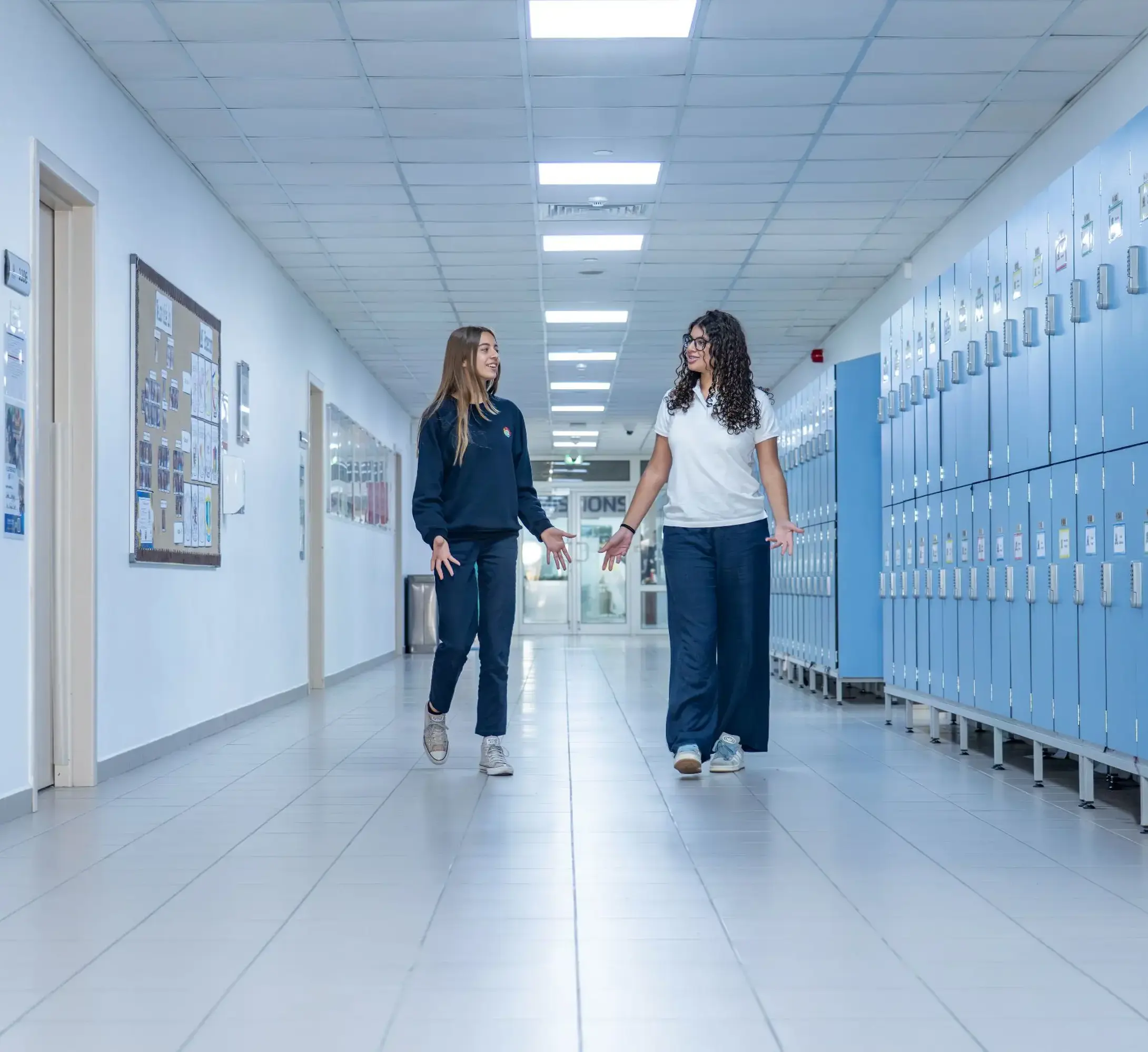 Students walking through school halls