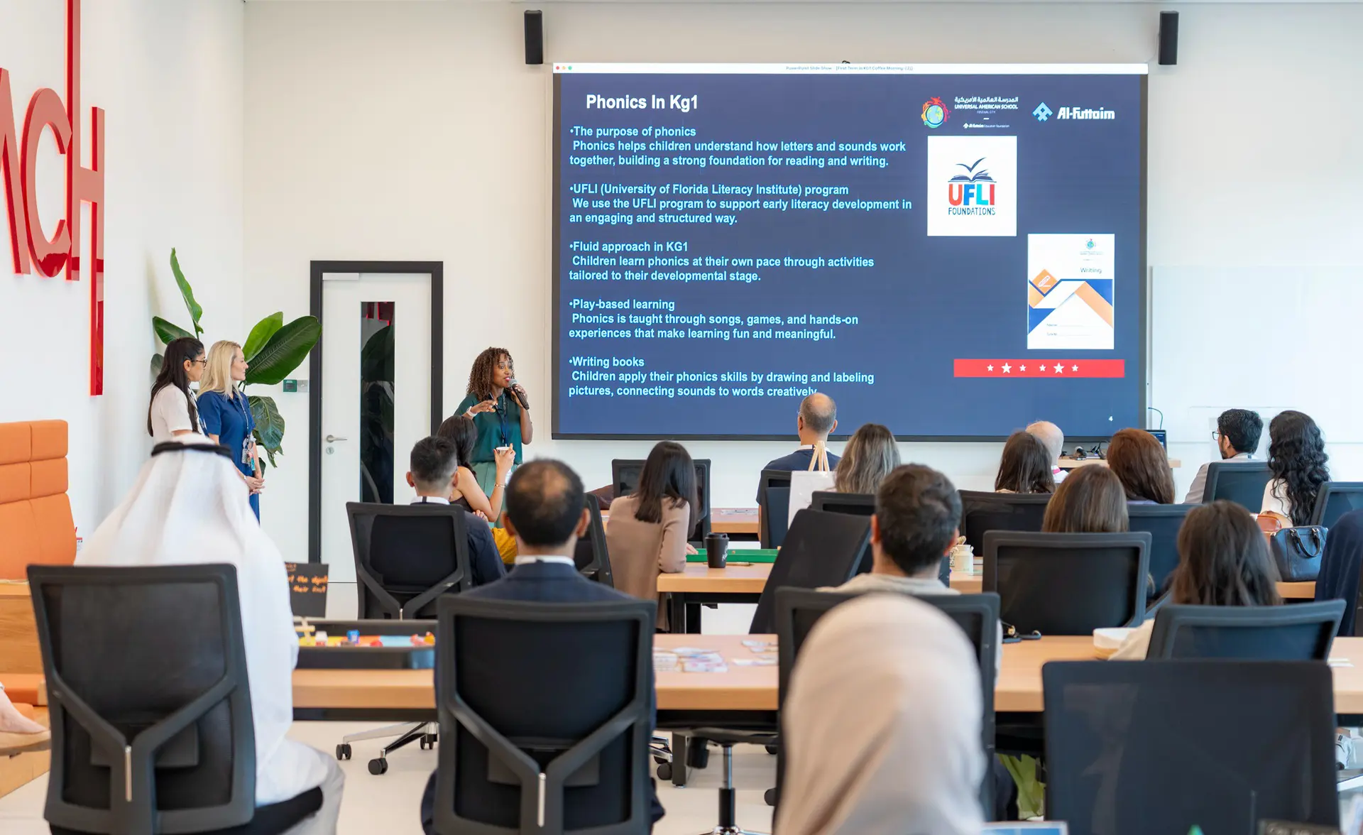 Teacher giving presentation in class