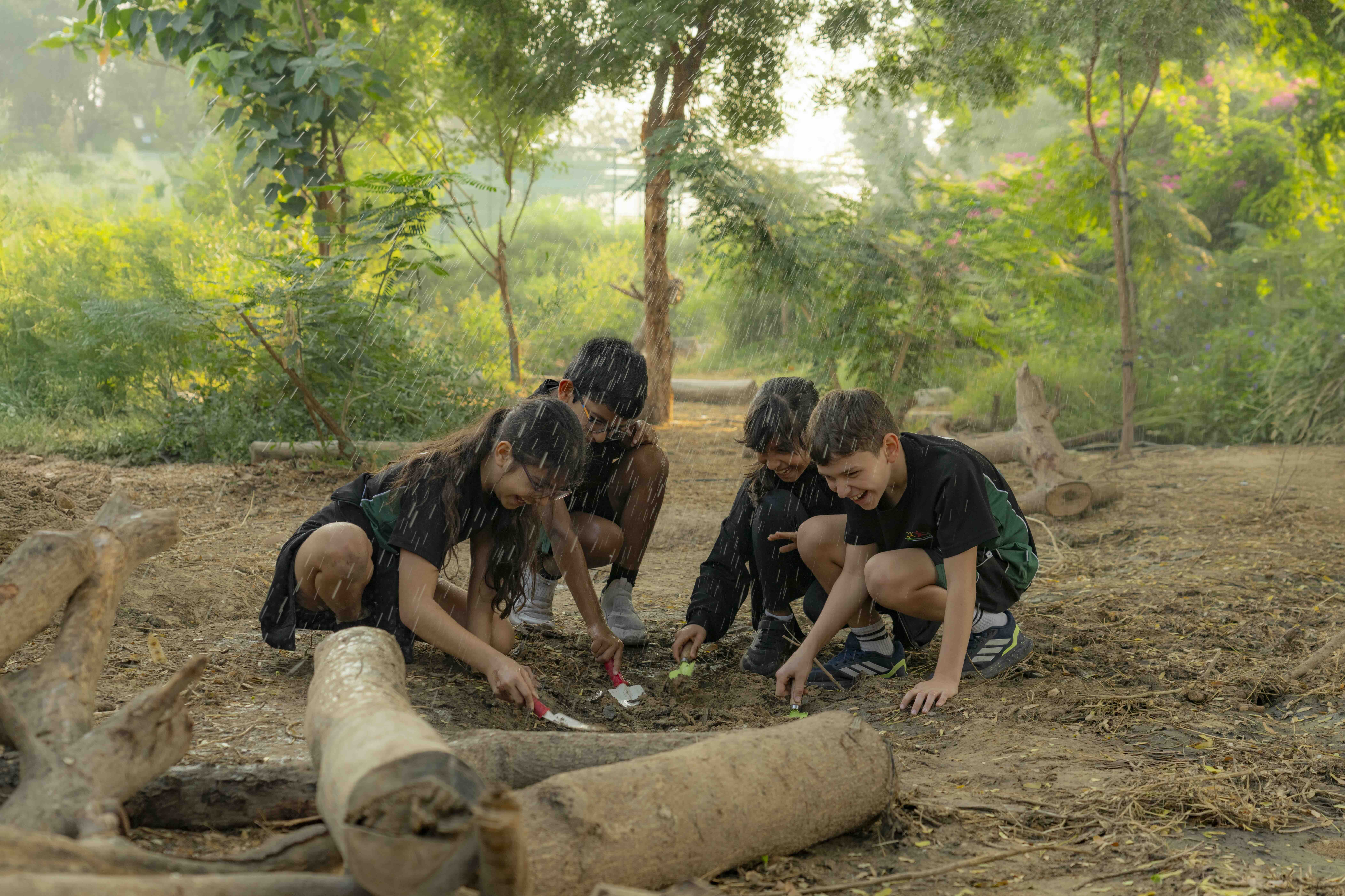 Students doing outdoor activities in rain