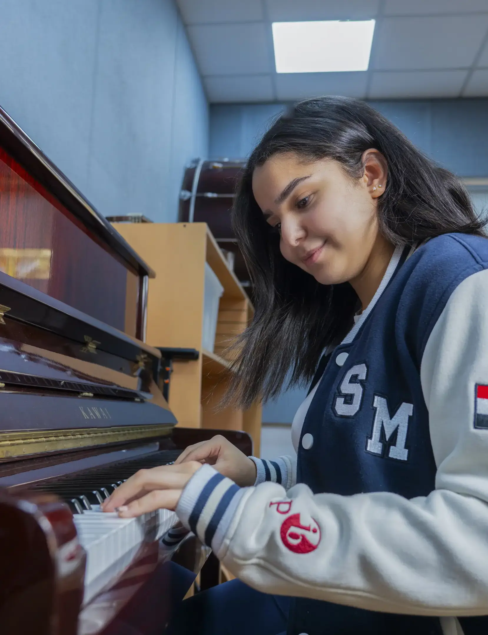 Student playing piano