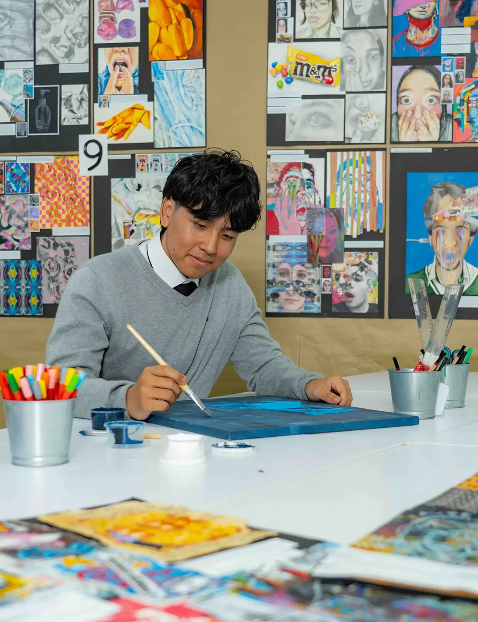 Student drawing in art class